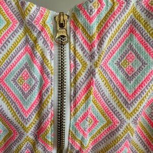 2T Oshkosh dress bright florescent colors. Zipper down the back.